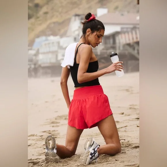 Free People Movement Carpe Diem Shorts in Red. - Picture 2 of 5